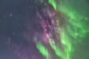 Northern Lights Over Frozen Lake